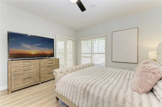 a view of a lake with a house in the background