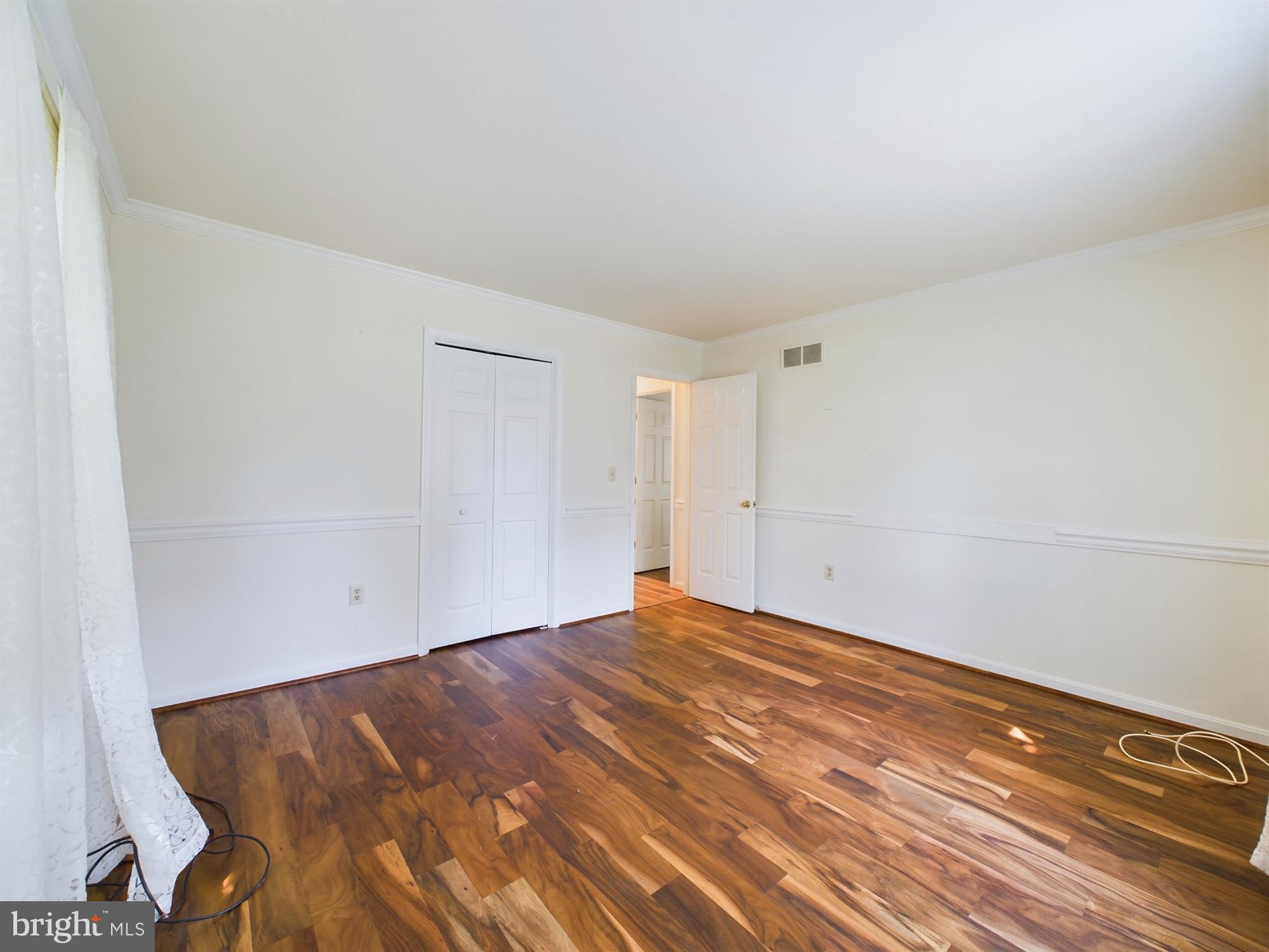 103 Birchfield Drive Dover, DE 19904 - Photo 24 of 44 a view of empty room with wooden floor