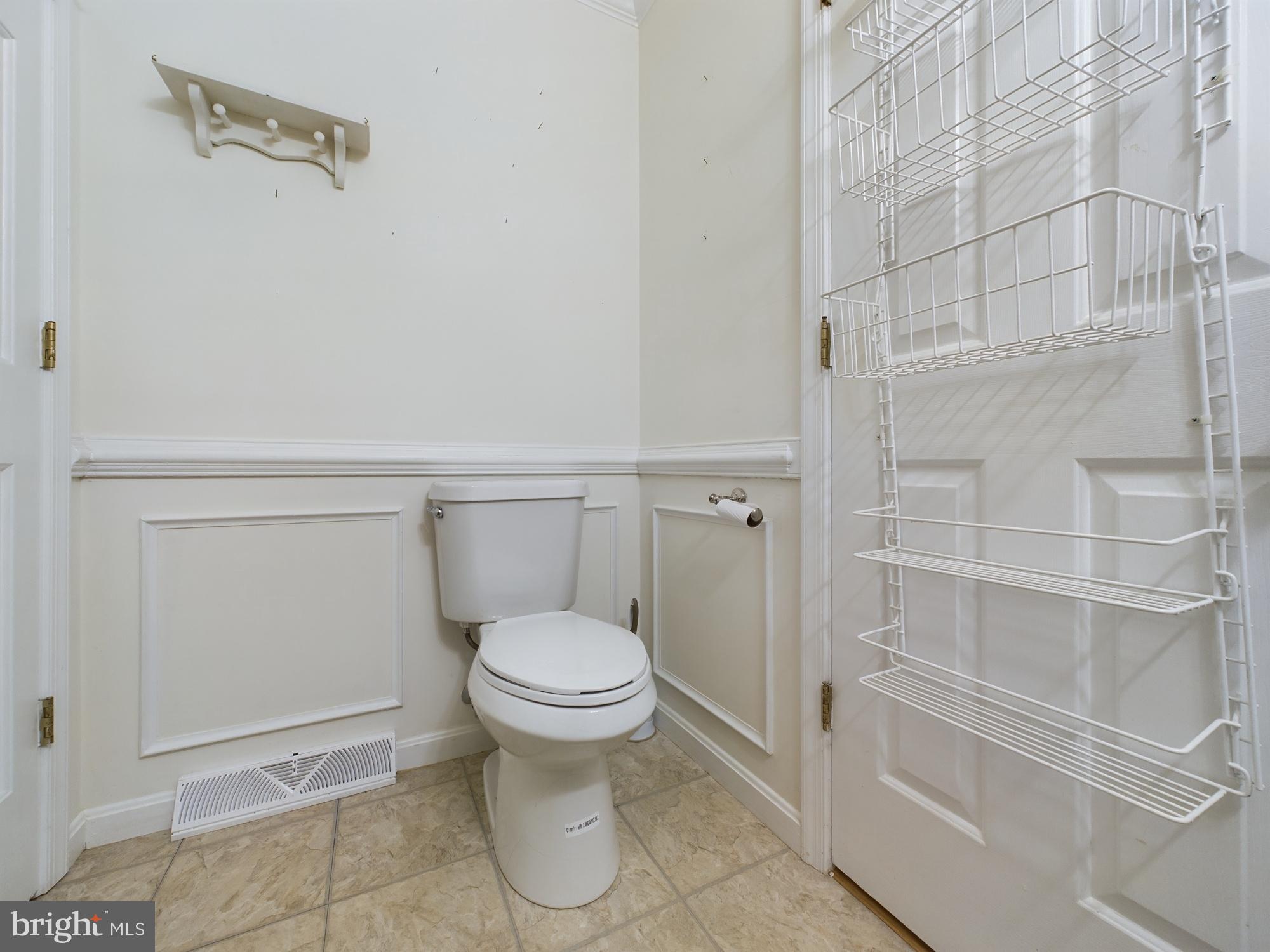 103 Birchfield Drive Dover, DE 19904 - Photo 28 of 44 a bathroom with a toilet and a shower