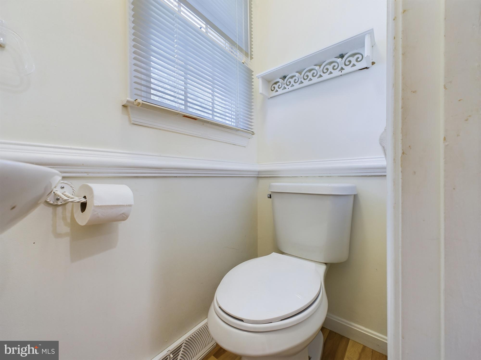103 Birchfield Drive Dover, DE 19904 - Photo 29 of 44 a bathroom with a toilet and a sink