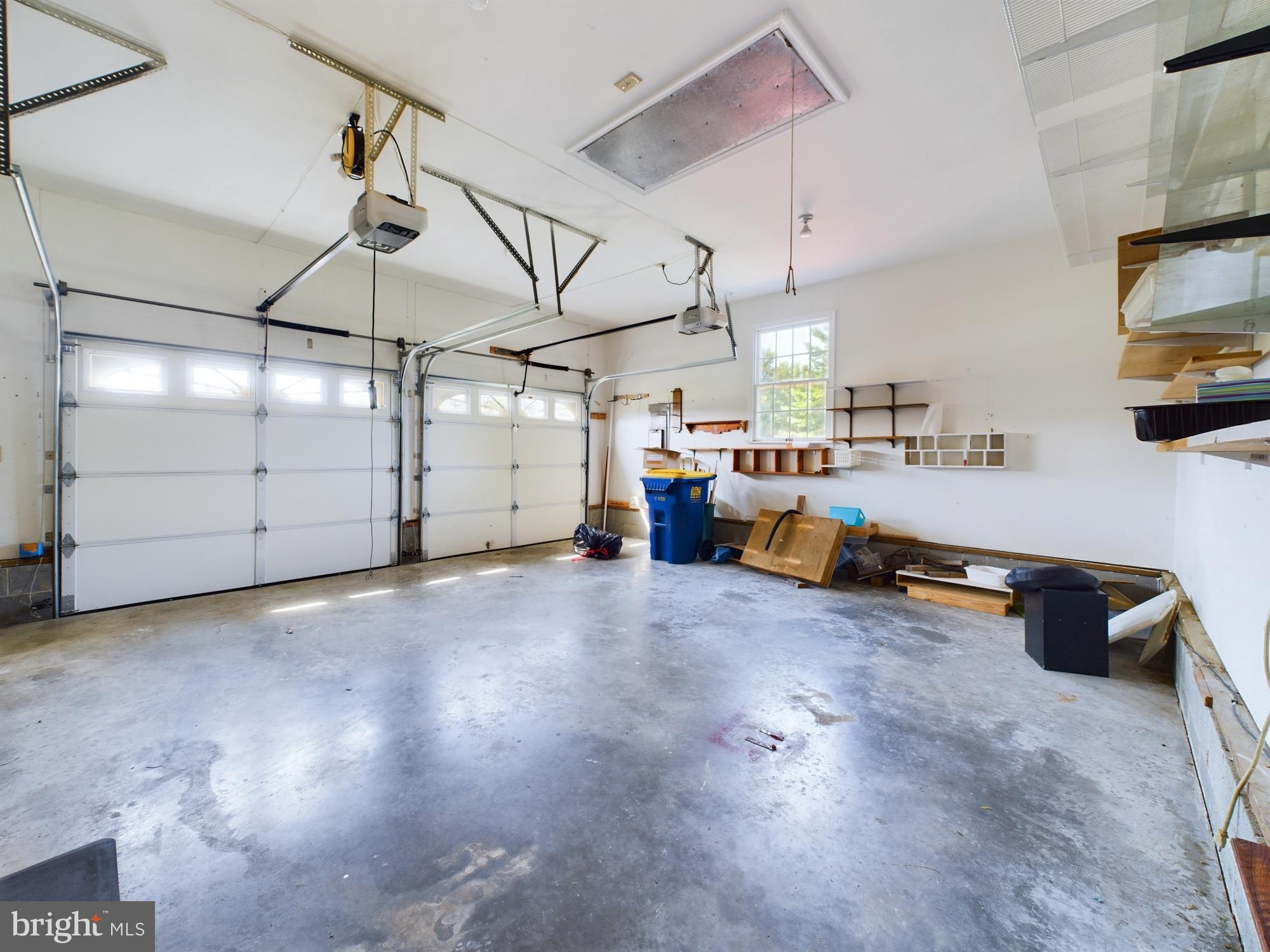 103 Birchfield Drive Dover, DE 19904 - Photo 33 of 44 a view of a garage with storage