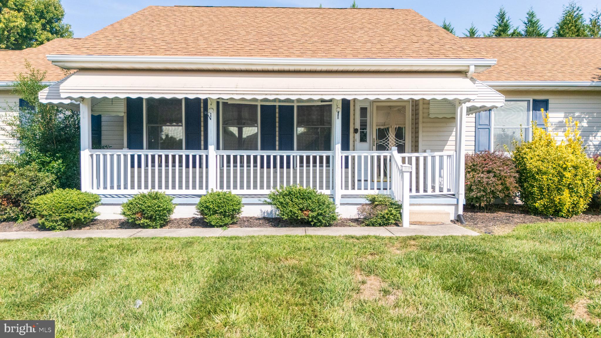 103 Birchfield Drive Dover, DE 19904 - Photo 4 of 44 a view of a house with a small yard and plants