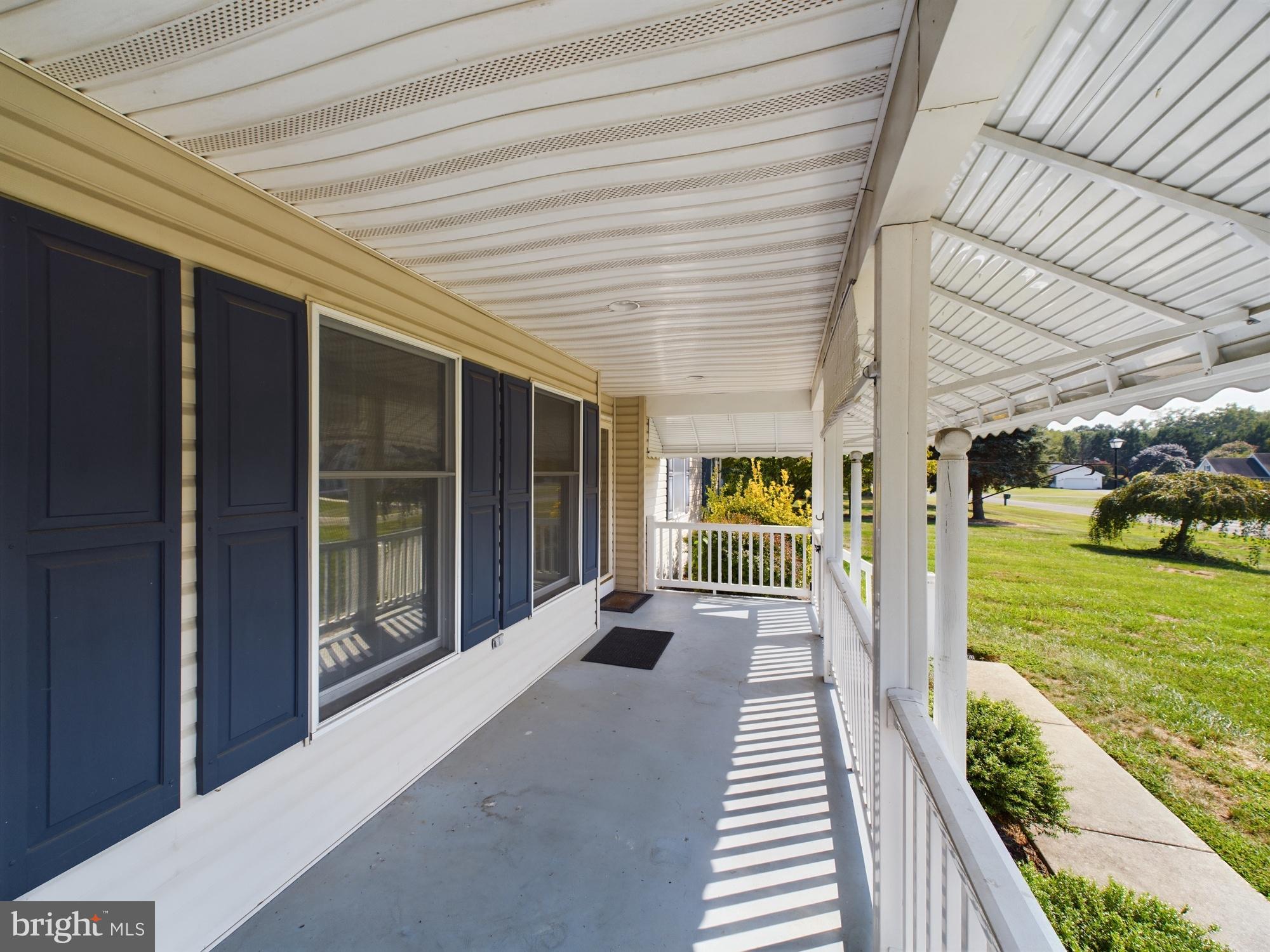103 Birchfield Drive Dover, DE 19904 - Photo 6 of 44 a front view of a house with a porch