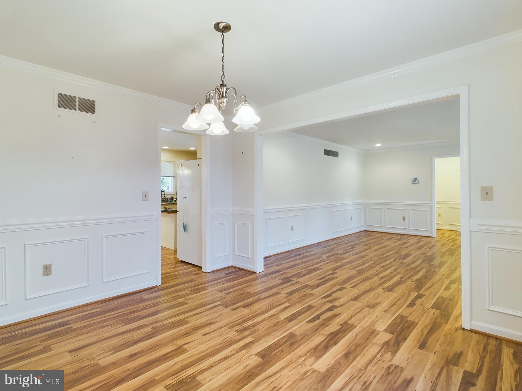 103 Birchfield Drive Dover, DE 19904 - Photo 10 of 44 a view of a chandelier in a room