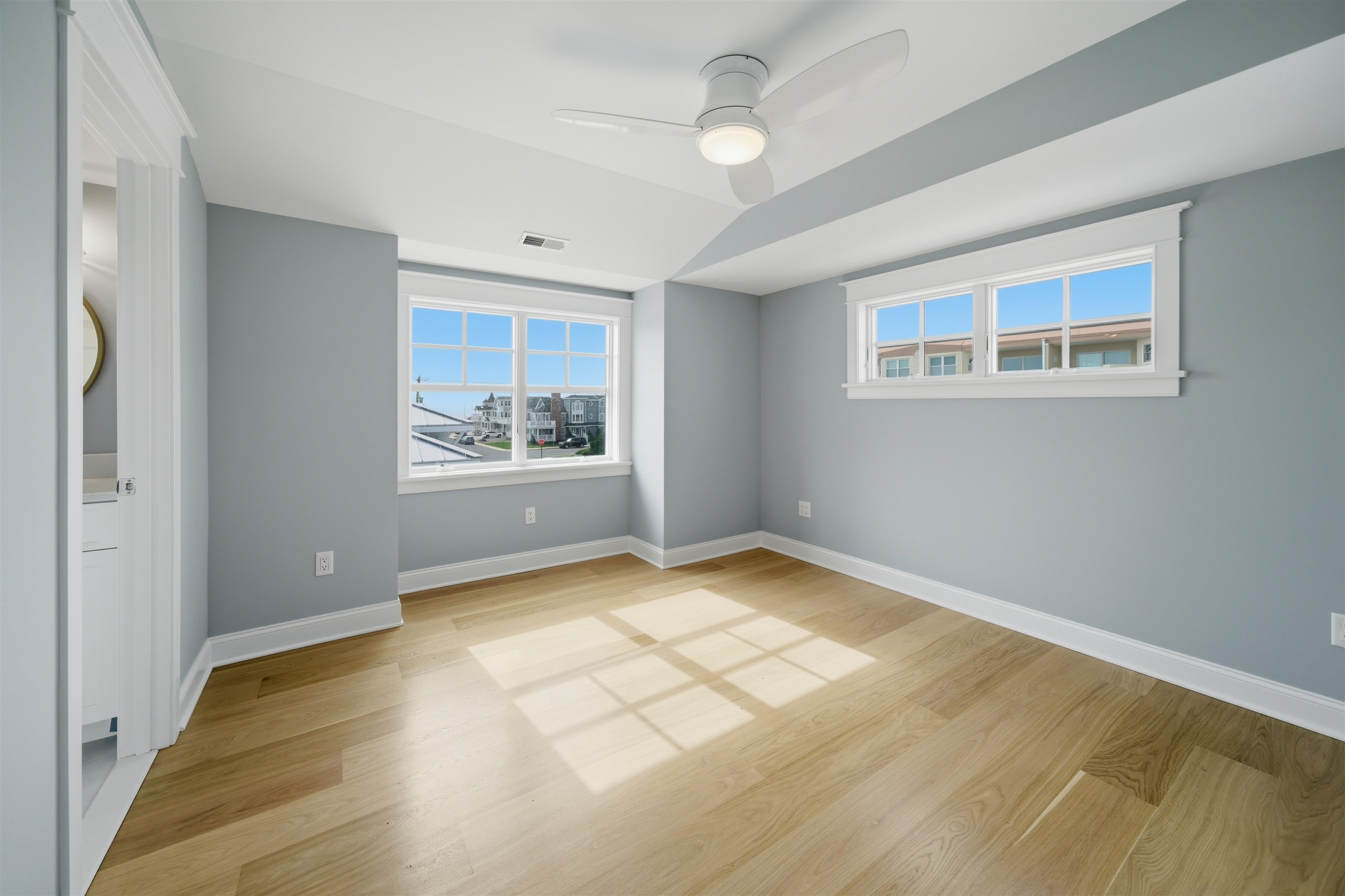 135 7th Street Avalon, NJ 08202 - Photo 44 of 50 a view of an empty room with a window