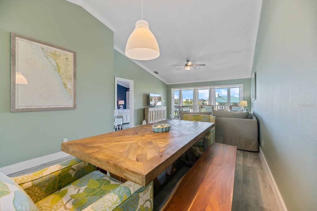 841 Waterside Drive, Unit 202 Venice, FL 34285 - Photo 12 of 43 a room with pool table and windows