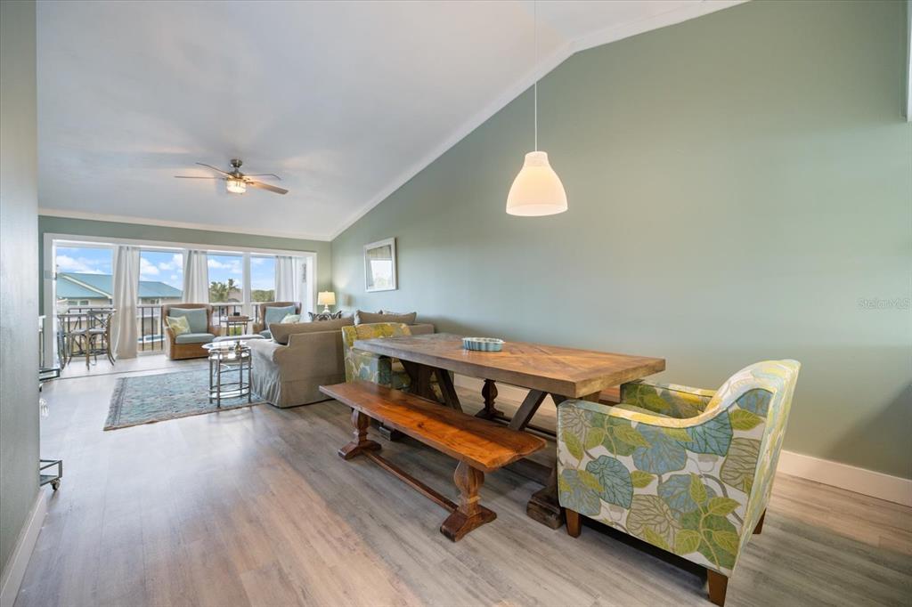 841 Waterside Drive, Unit 202 Venice, FL 34285 - Photo 21 of 43 a reading room with furniture and wooden floor