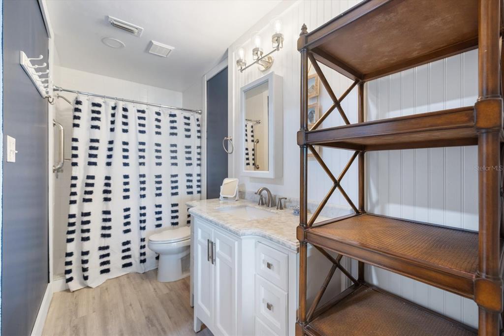 841 Waterside Drive, Unit 202 Venice, FL 34285 - Photo 31 of 43 a view of hallway with furniture