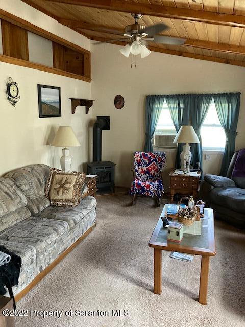 431 Gontarski Road Hallstead, PA 18822 - Photo 13 of 18 a living room with furniture and a chandelier