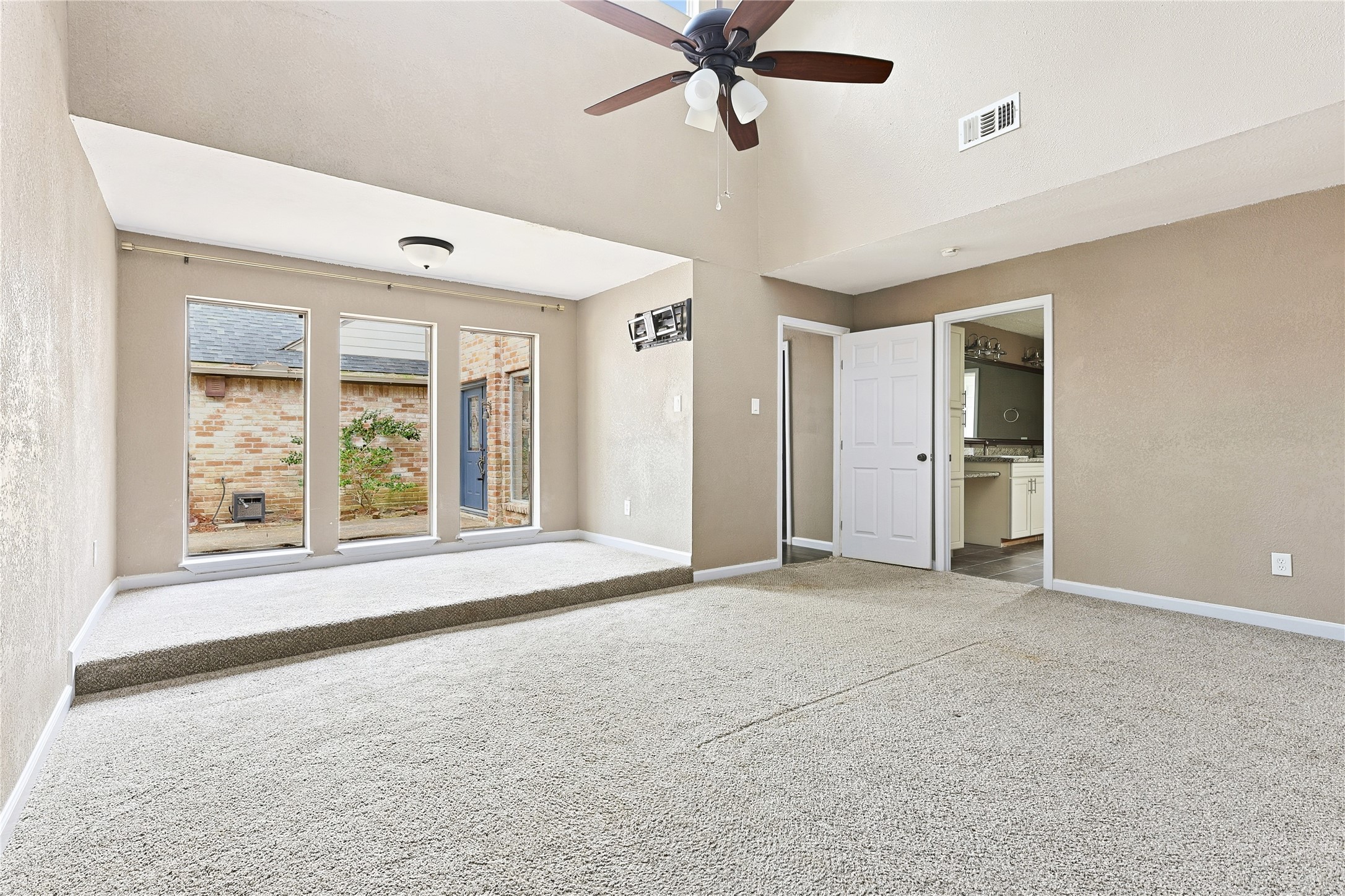 11727 Gardenglen Drive Cypress, TX 77429 - Photo 20 of 38 a view of an empty room with a window