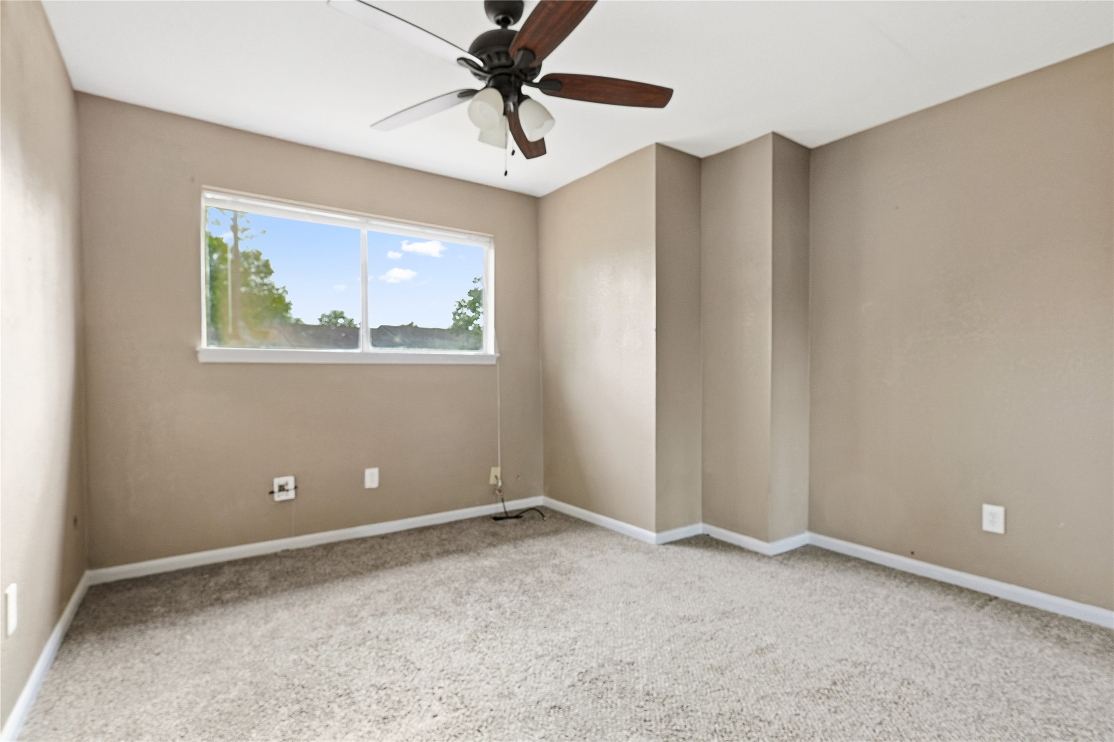 11727 Gardenglen Drive Cypress, TX 77429 - Photo 25 of 38 a view of an empty room with a window