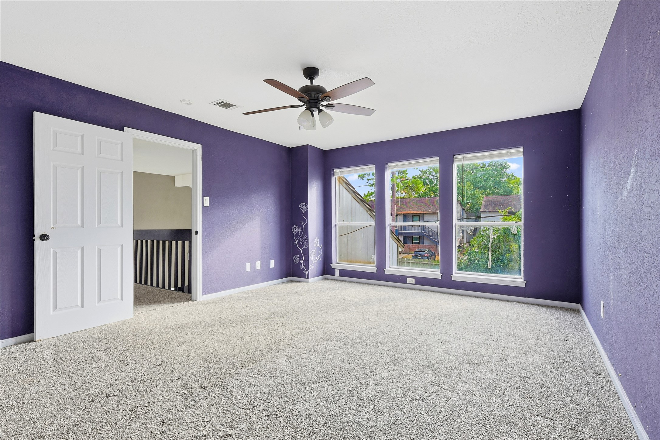 11727 Gardenglen Drive Cypress, TX 77429 - Photo 27 of 38 a view of a livingroom with a ceiling fan and window