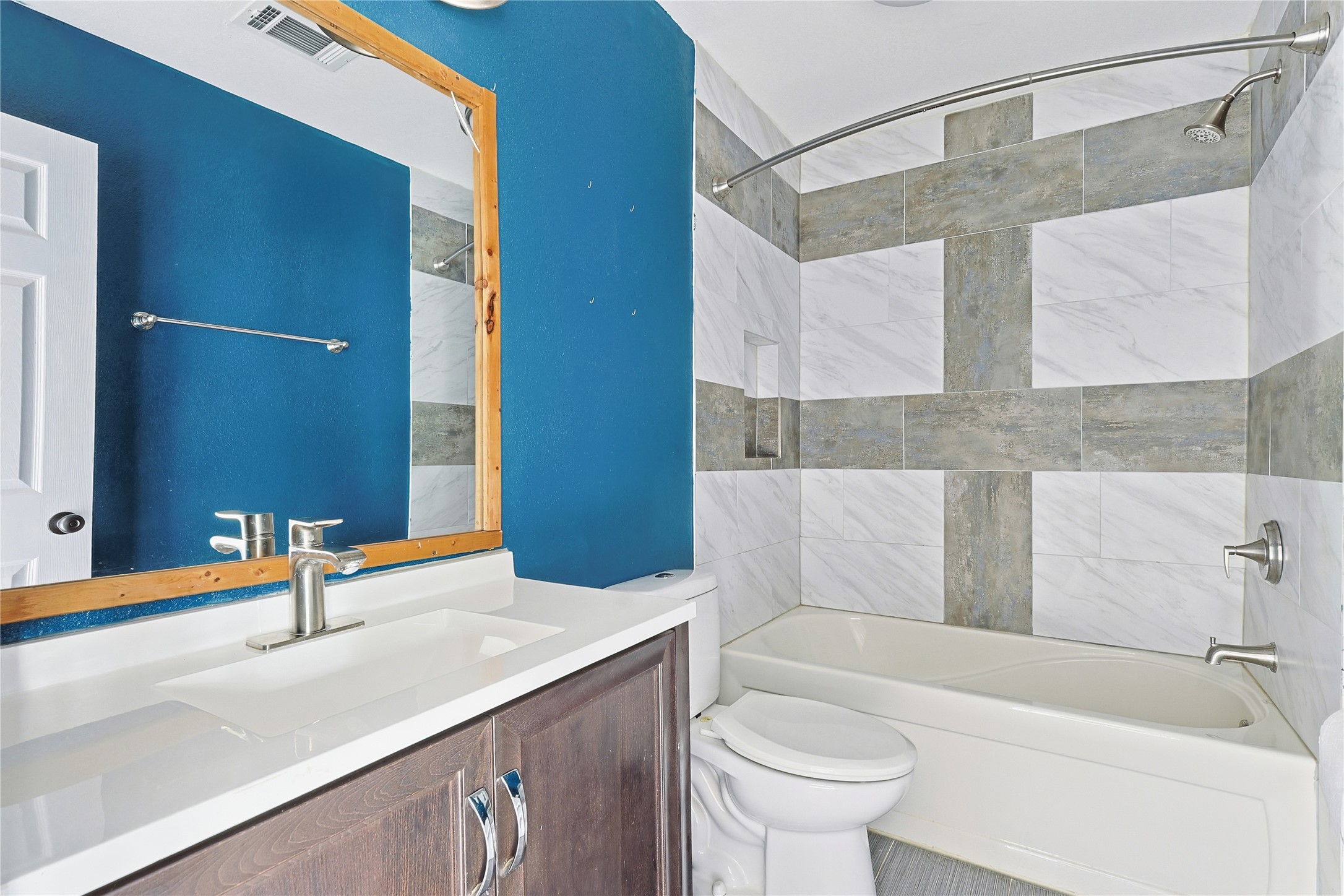 11727 Gardenglen Drive Cypress, TX 77429 - Photo 29 of 38 a bathroom with a sink and a mirror