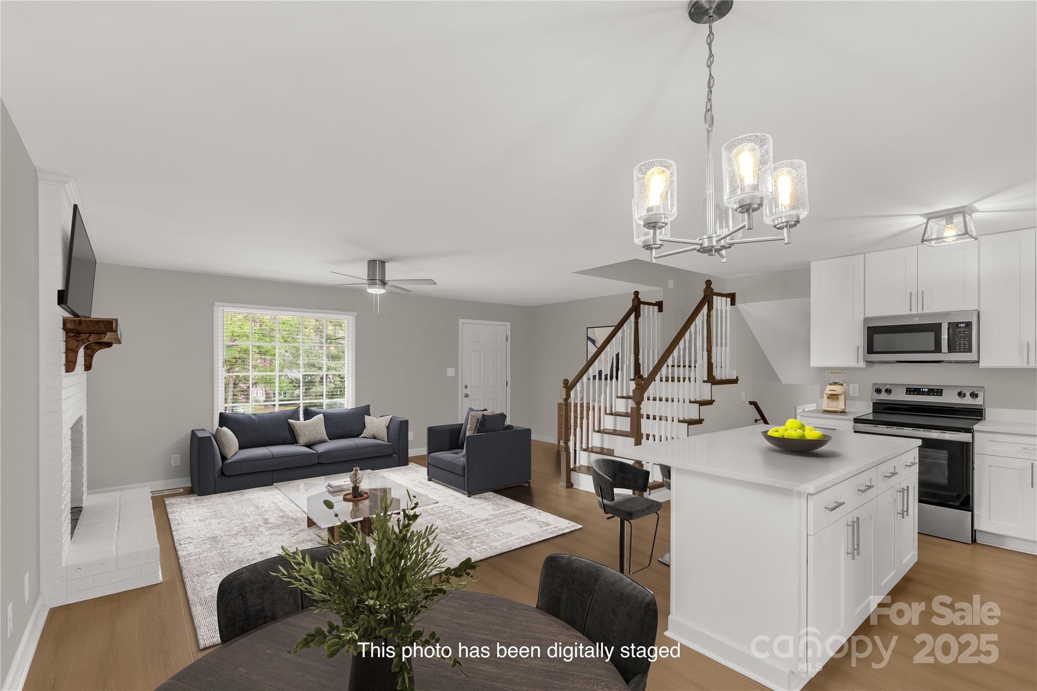 2220 Ross Cauthen Road Lancaster, SC 29720 - Photo 6 of 29 a view of a dining room with furniture a chandelier and wooden floor