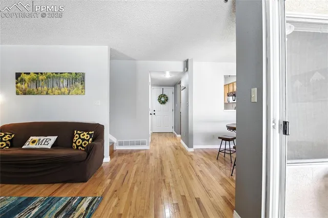 a with a bench sitting next to a bathroom