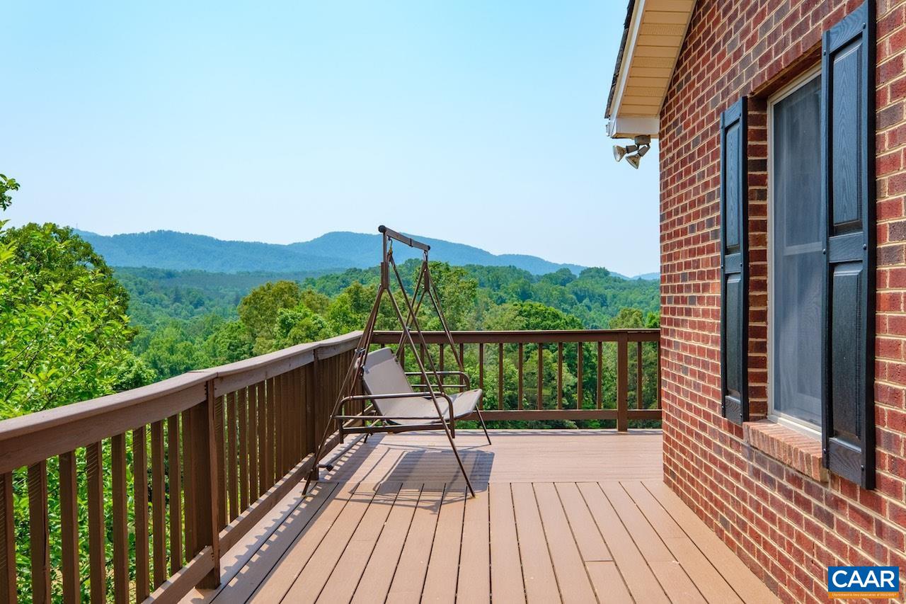 132 Rocky Road Lovingston, VA 22949 - Photo 10 of 48 a view of balcony with wooden floor and fence