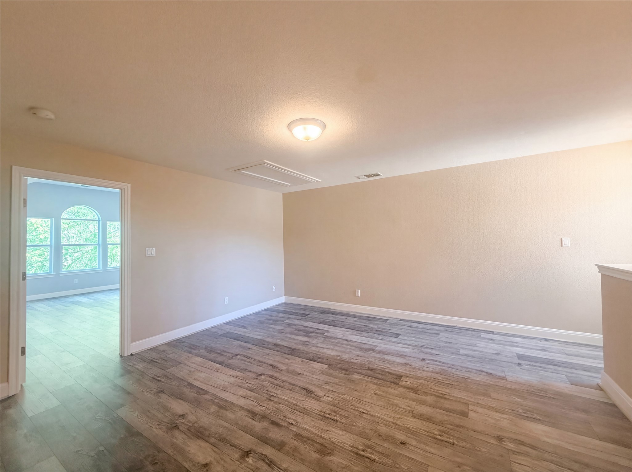 104 Perpetuation Drive Austin, TX 78734 - Photo 21 of 29 Unfurnished room with light wood-type flooring
