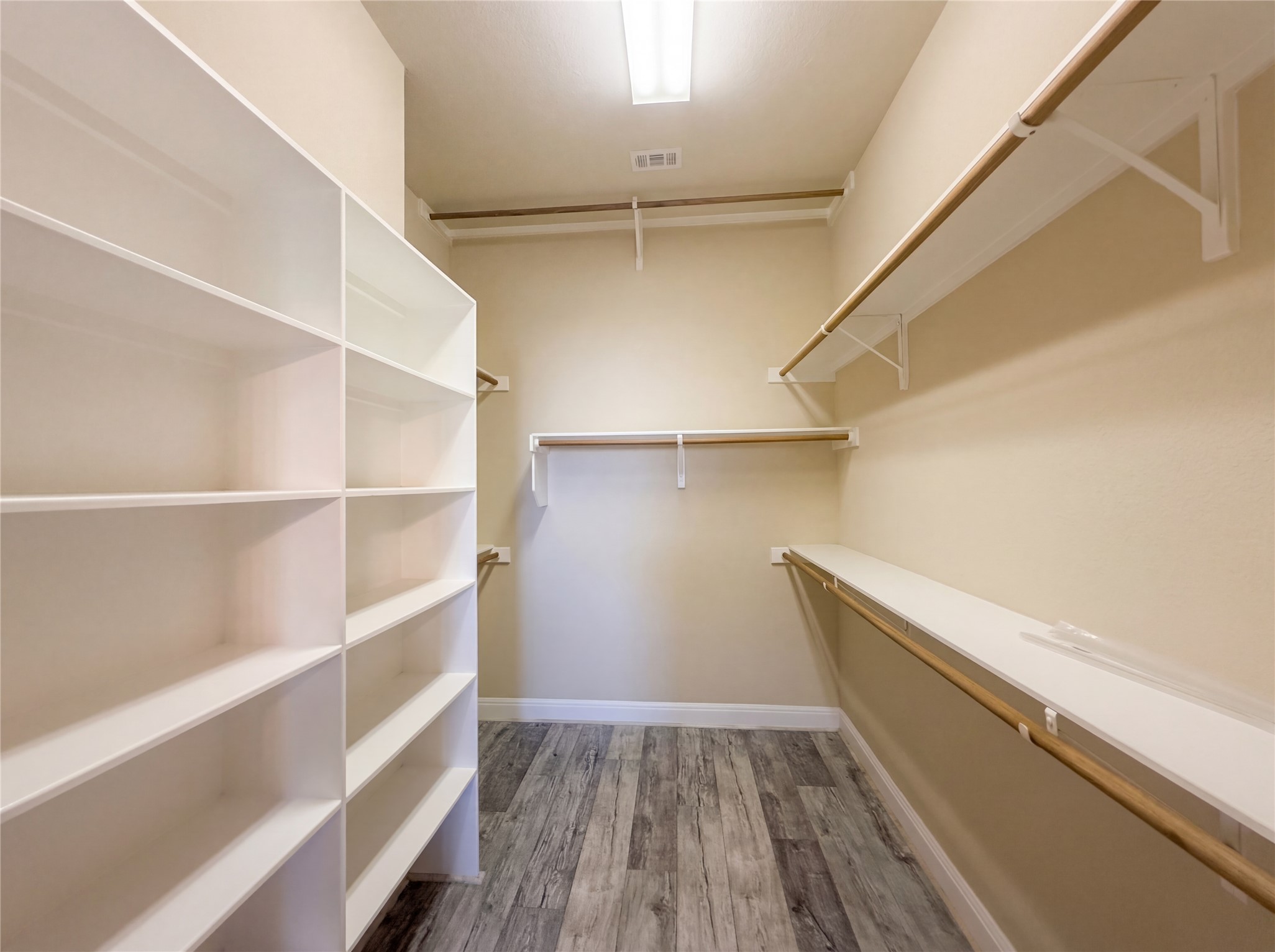 104 Perpetuation Drive Austin, TX 78734 - Photo 24 of 29 Walk in closet with light wood-type flooring