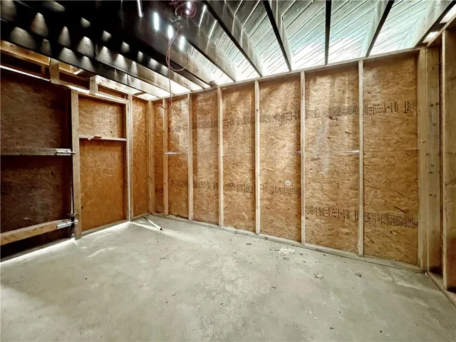 a view of an empty room with sliding door