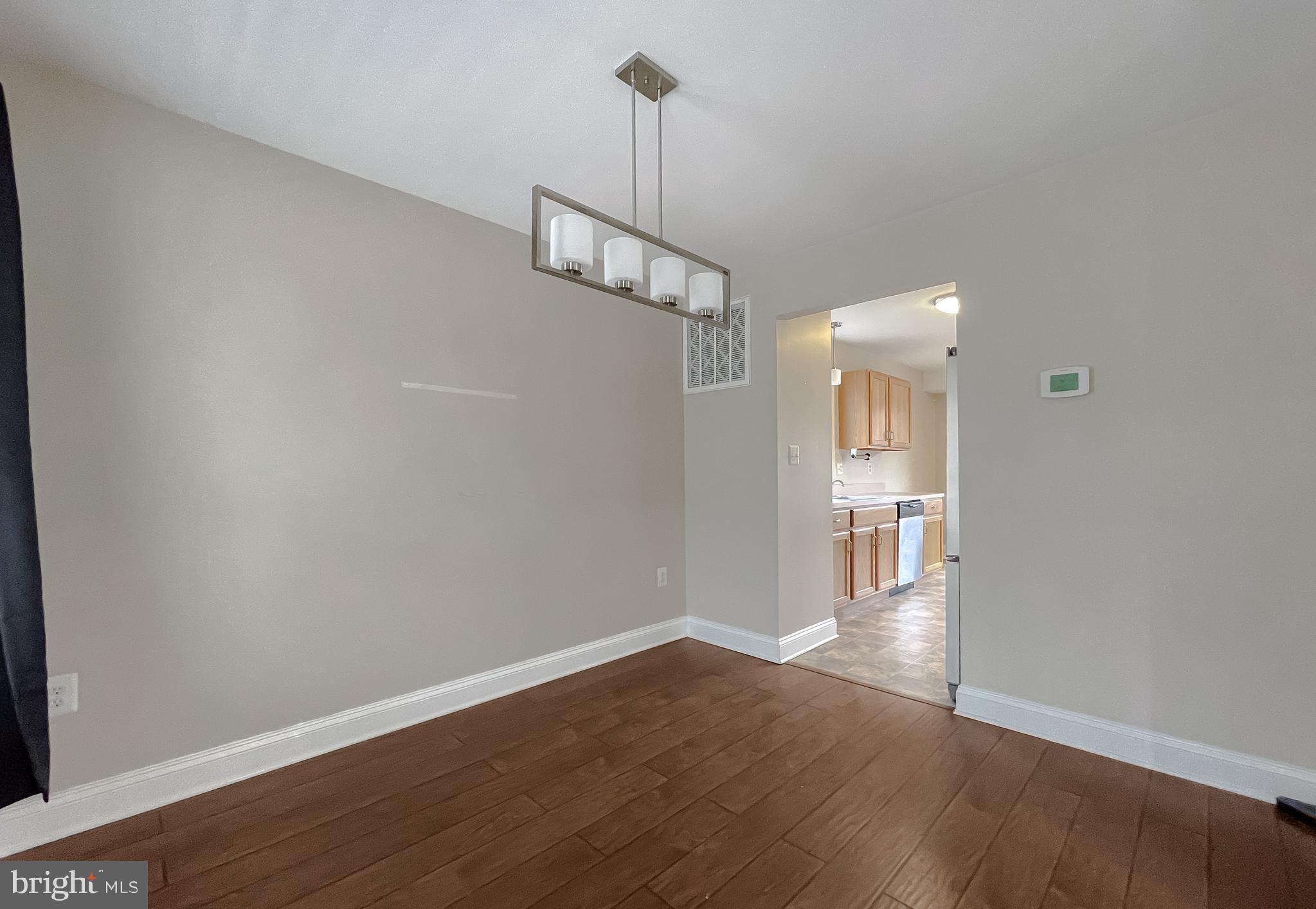 12968 Sailboat Lane Lusby, MD 20657 - Photo 12 of 57 a view of a room with wooden floor closet and a window