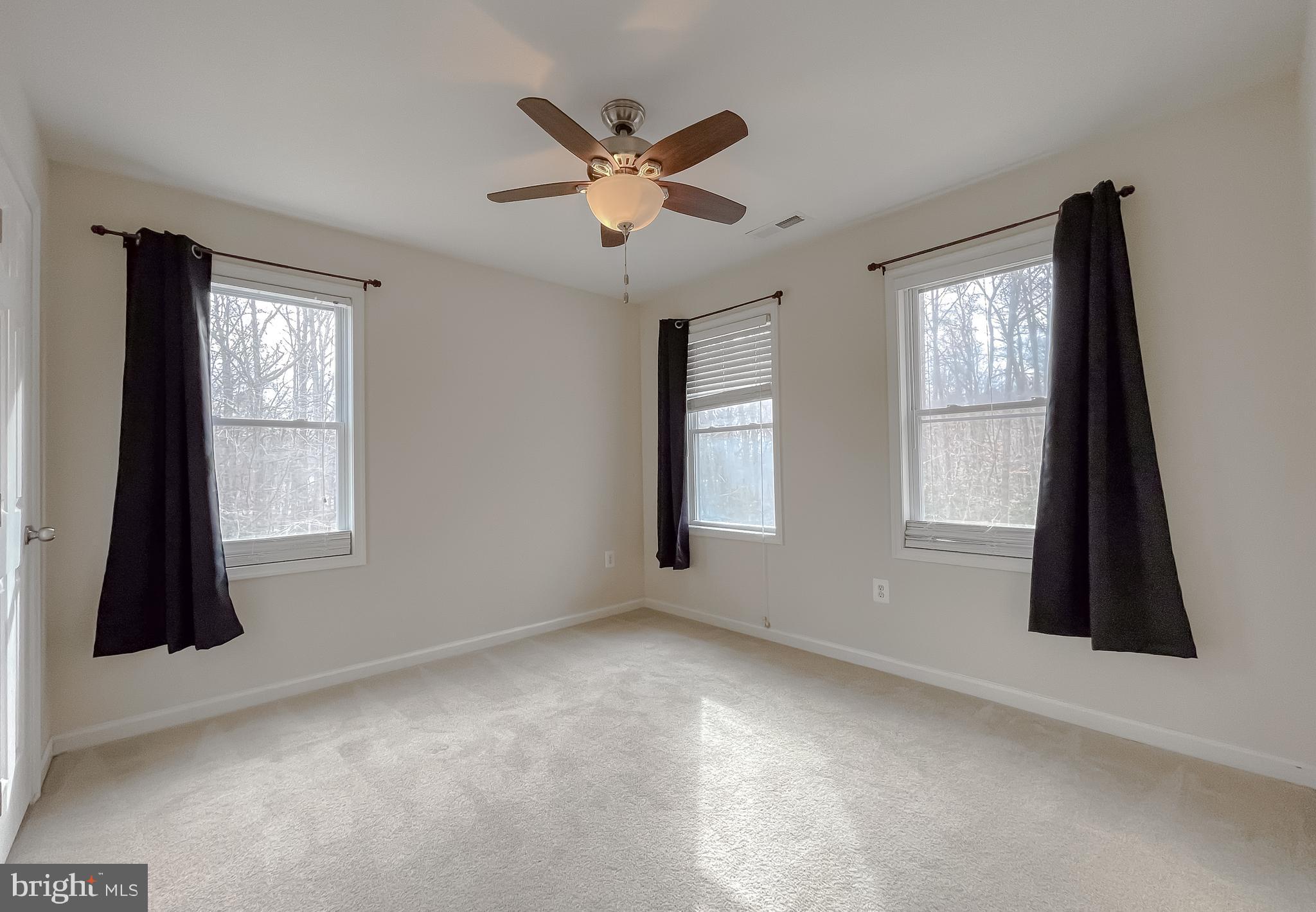 12968 Sailboat Lane Lusby, MD 20657 - Photo 27 of 57 a view of an empty room with a window