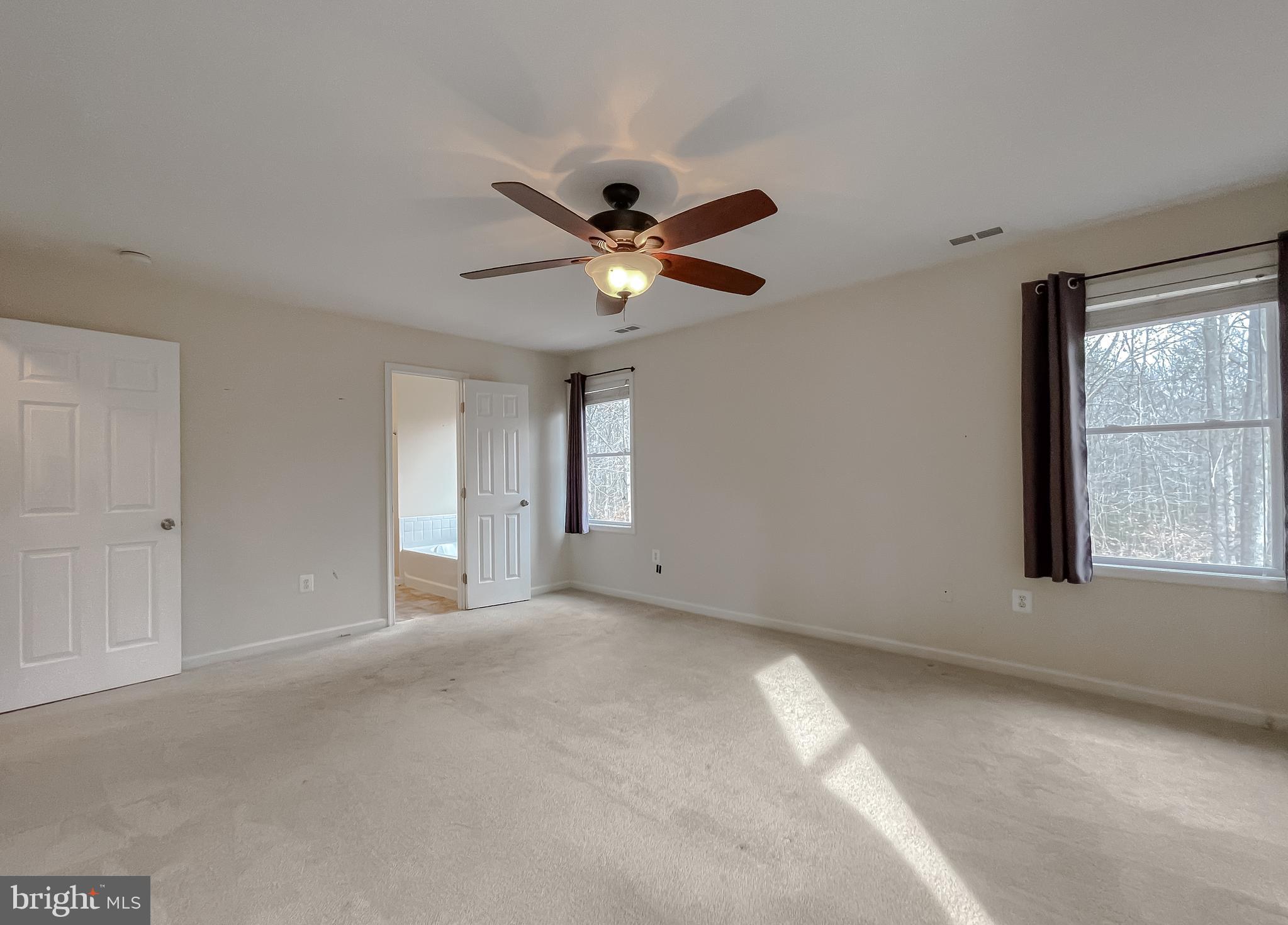12968 Sailboat Lane Lusby, MD 20657 - Photo 38 of 57 a view of an empty room with a window
