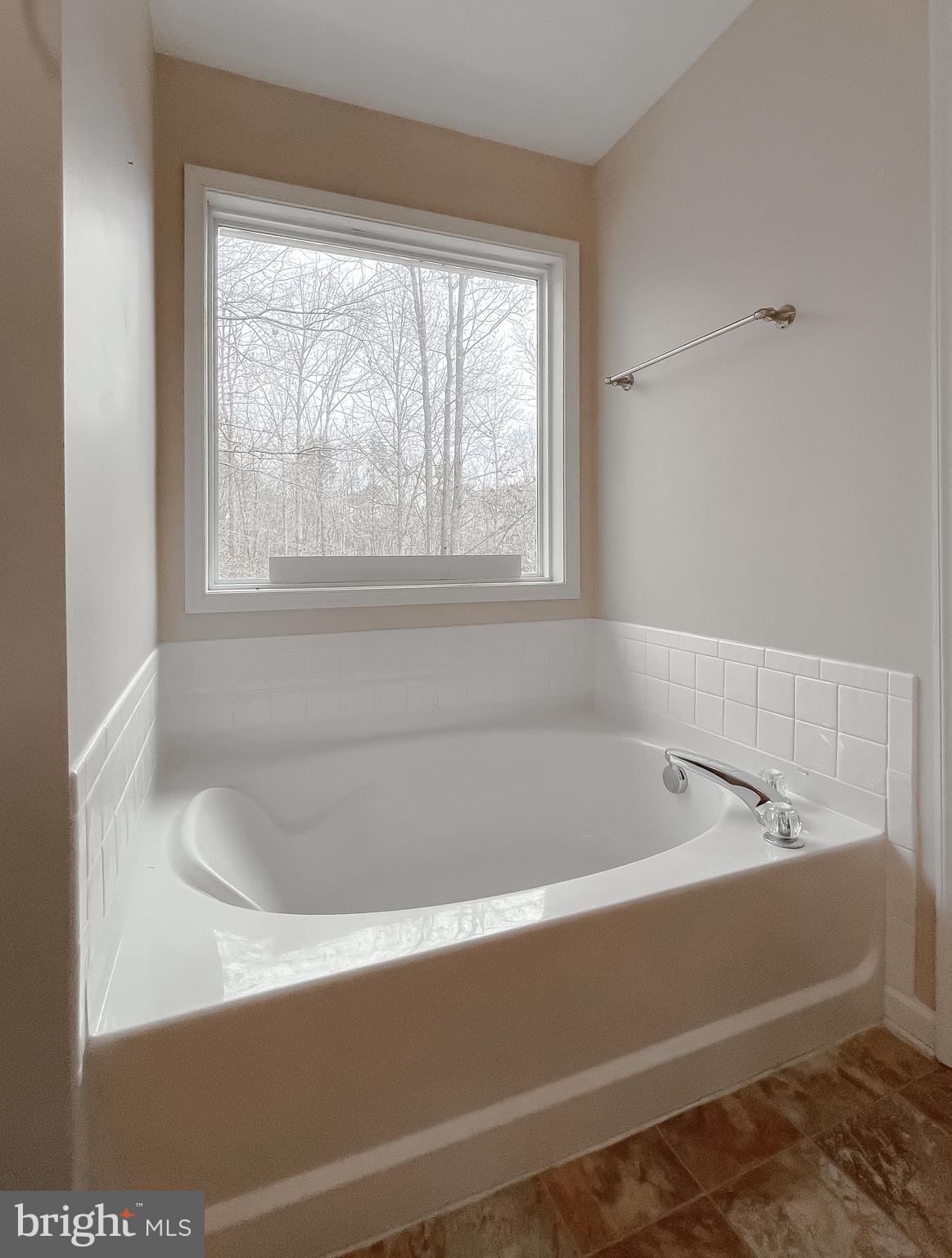 12968 Sailboat Lane Lusby, MD 20657 - Photo 44 of 57 a bathroom with a bathtub