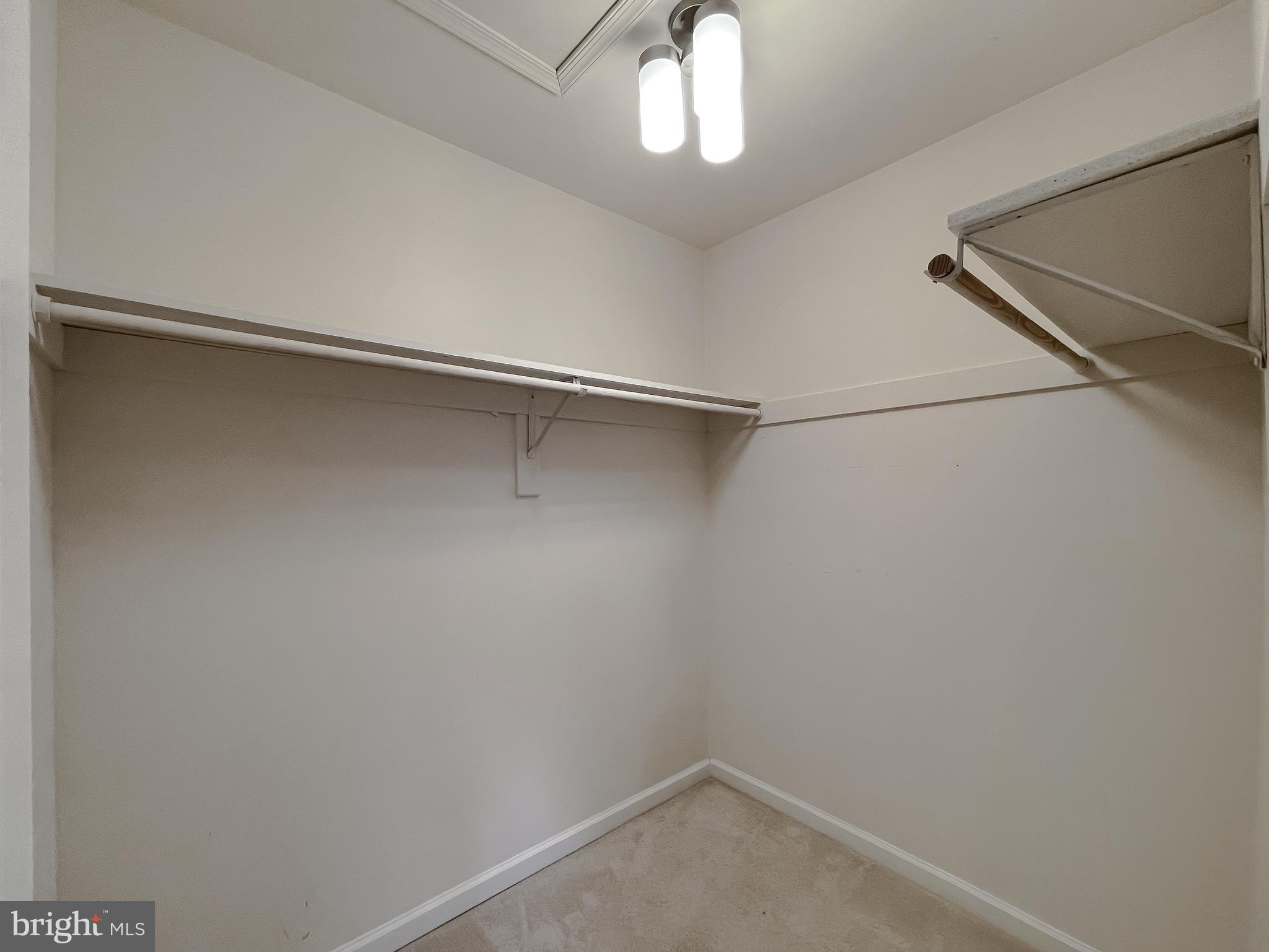 12968 Sailboat Lane Lusby, MD 20657 - Photo 45 of 57 a view of a room with racks on the wall