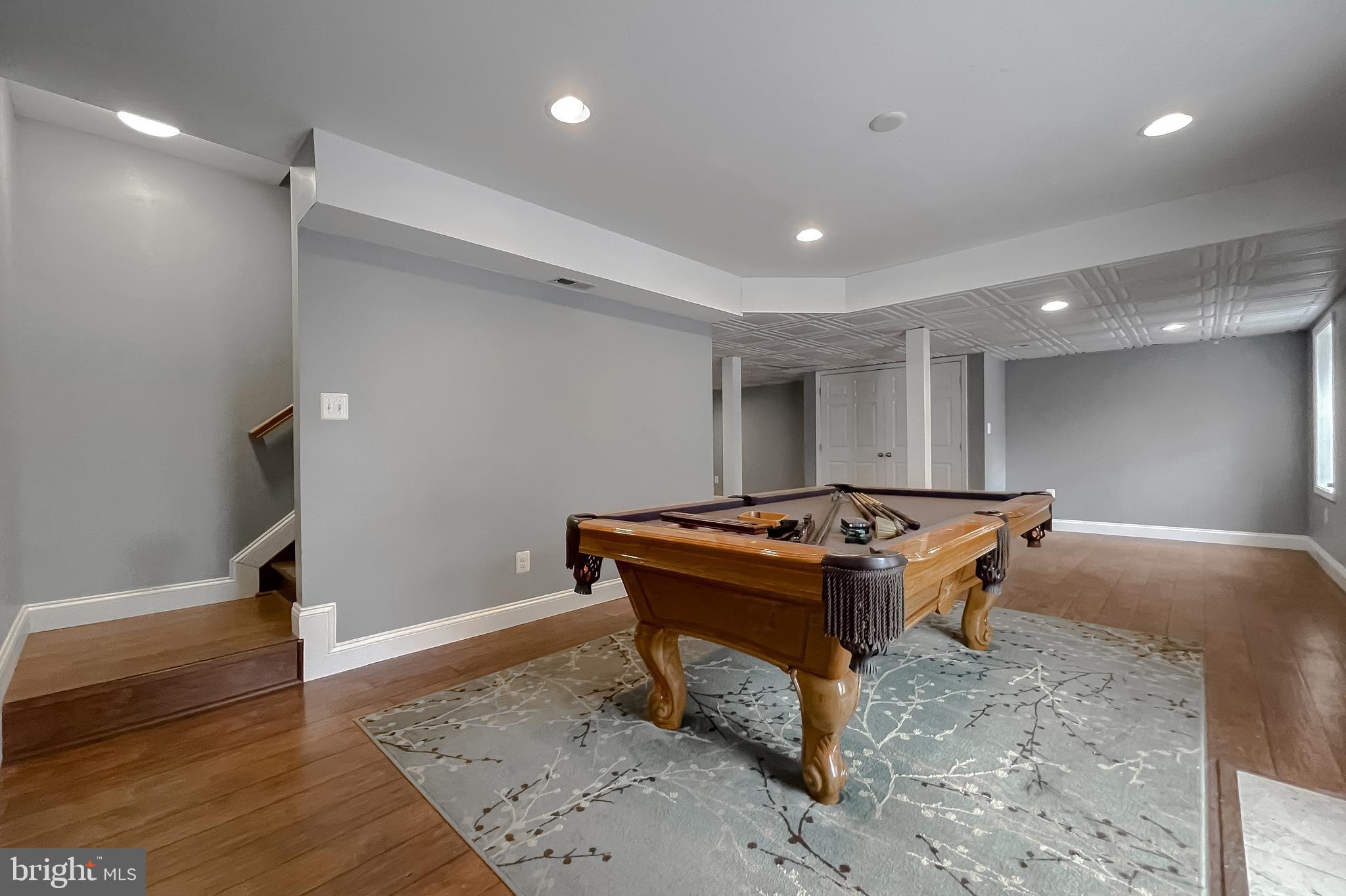 12968 Sailboat Lane Lusby, MD 20657 - Photo 46 of 57 a room with furniture pool table and wooden floor