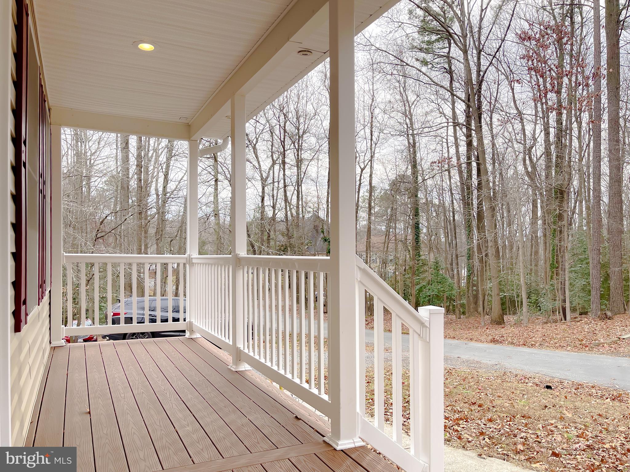 12968 Sailboat Lane Lusby, MD 20657 - Photo 5 of 57 a view of a wooden deck
