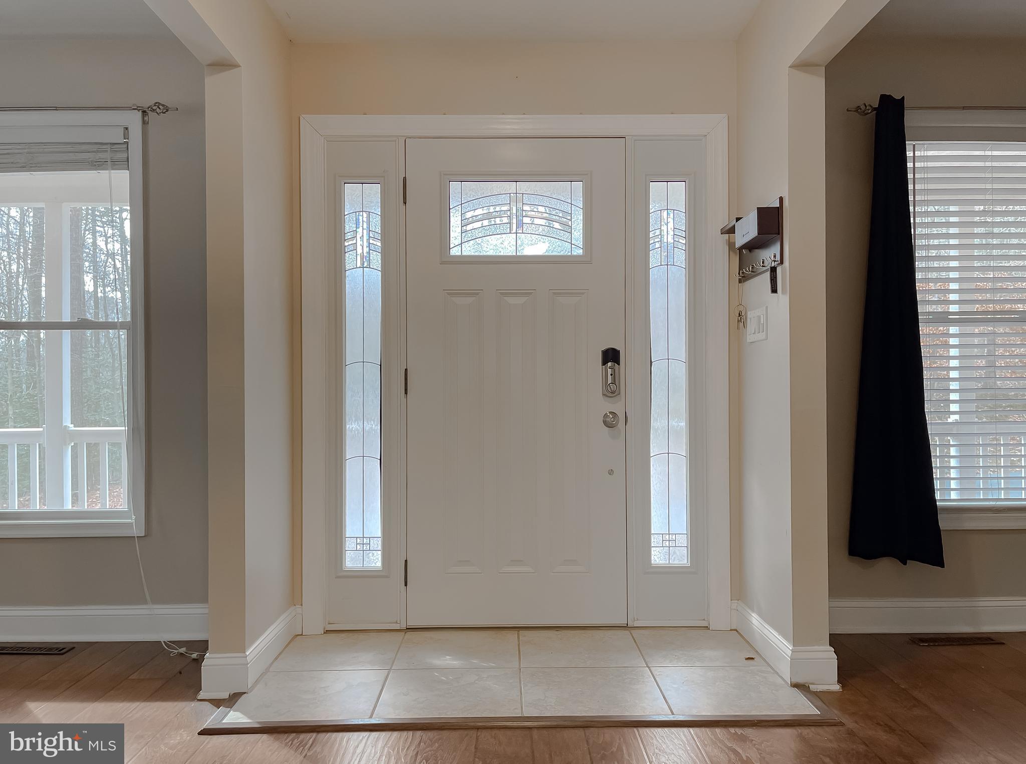 12968 Sailboat Lane Lusby, MD 20657 - Photo 6 of 57 an empty room with windows