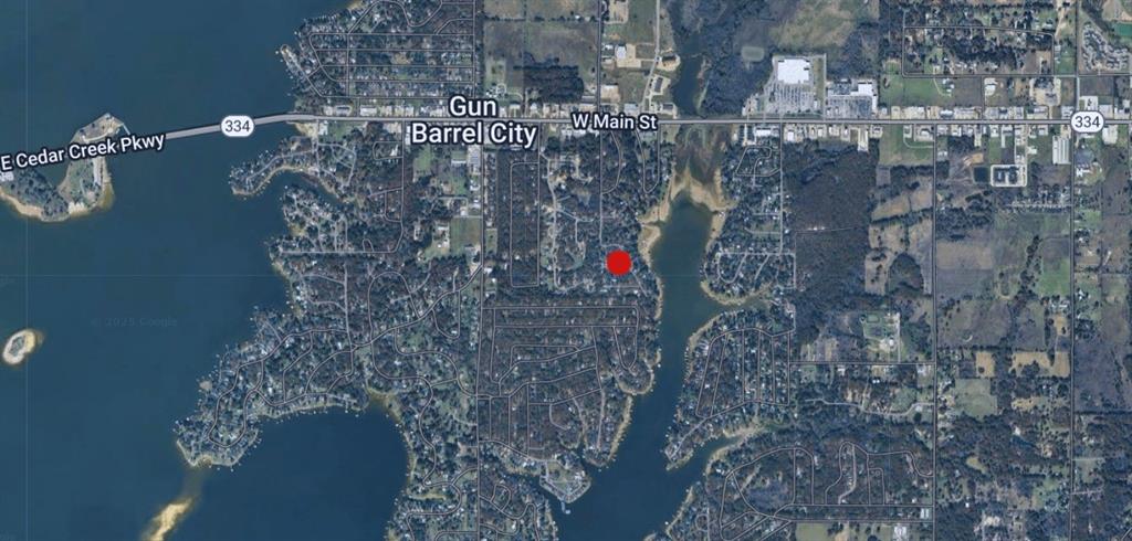 0 Redbud Road Gun Barrel City, TX 75156 - Photo 6 of 6 a aerial view of multi story residential building with yard and outdoor seating