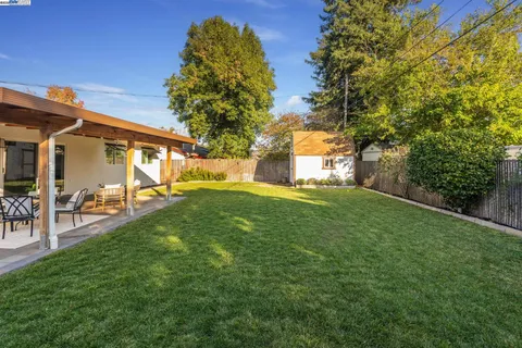 a view of a house with a big yard