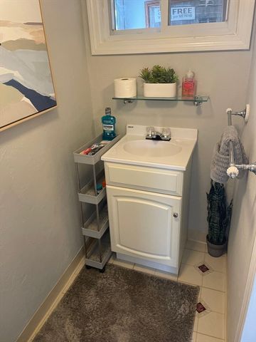 a picture of a book and a white wall