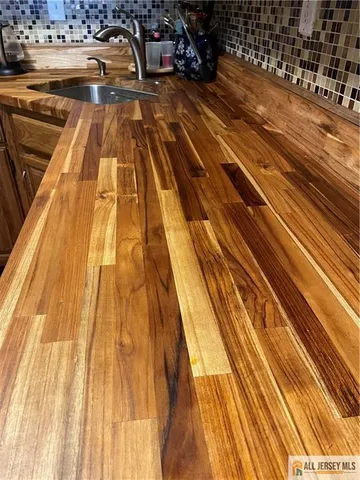 a view of a backyard with sitting area