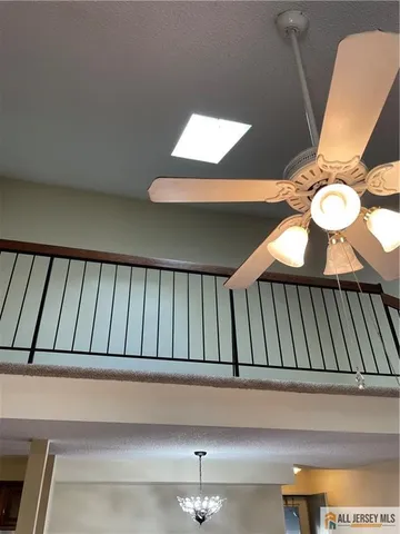 a view of staircase with sitting area