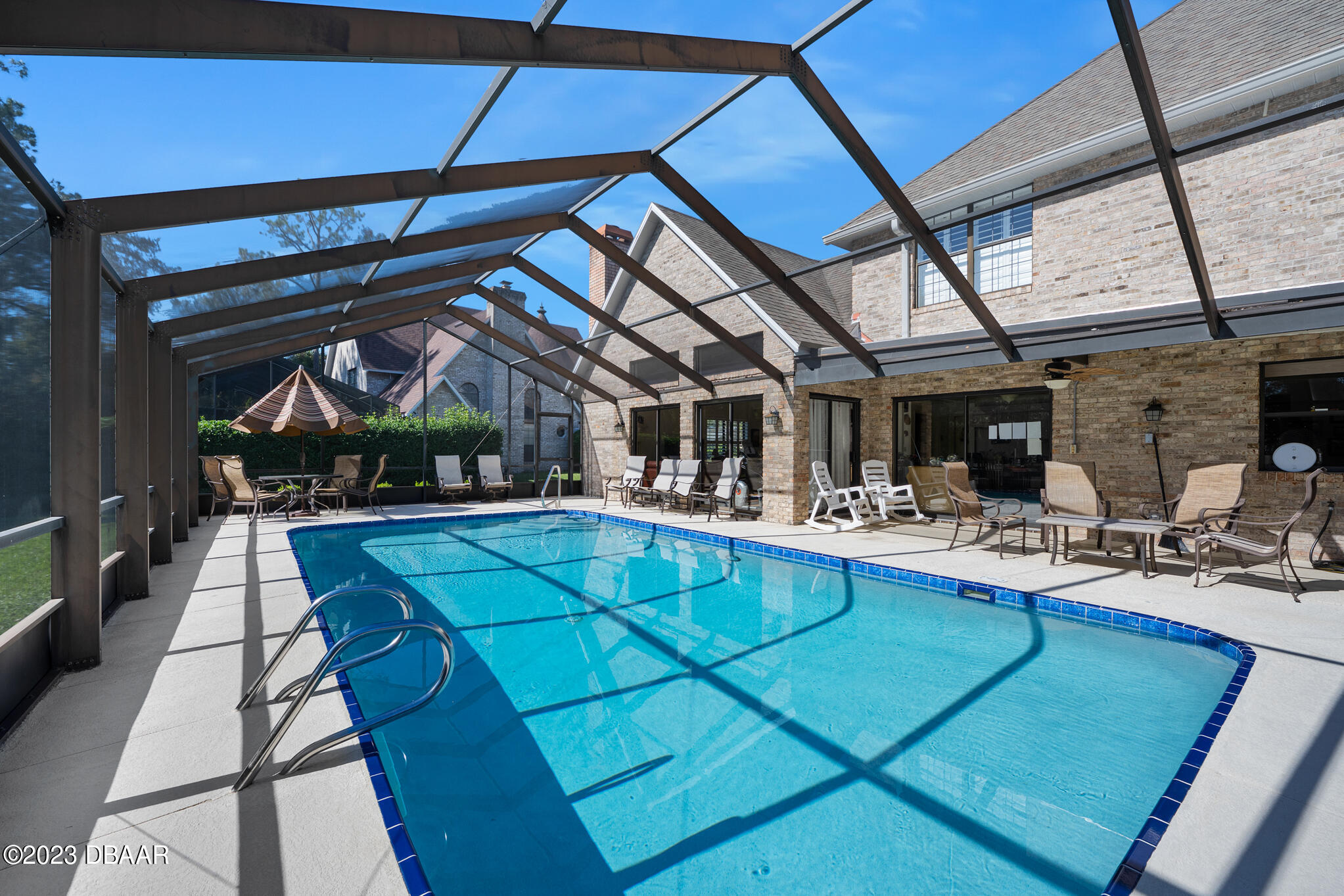 48 Winding Creek Way Ormond Beach, FL 32174 - Photo 10 of 11 a view of a swimming pool with a patio