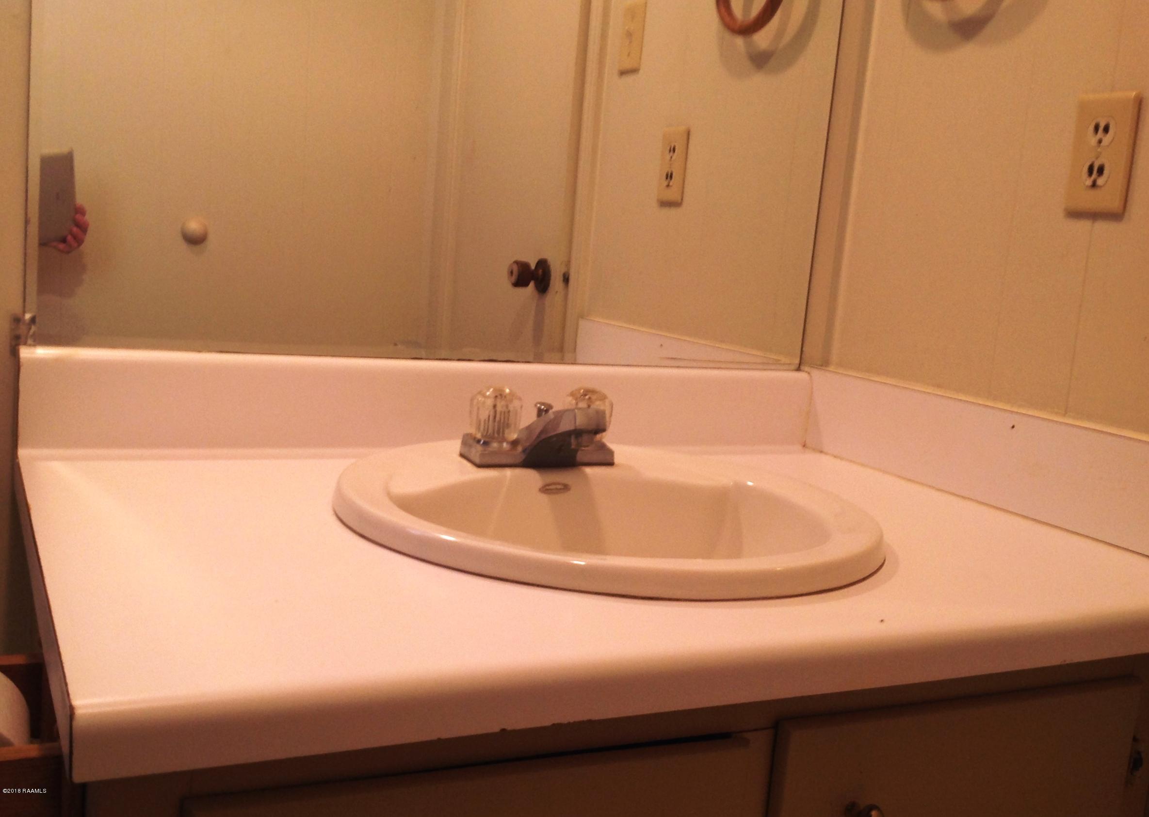 706 Picard Road, Unit 20 Milton, LA 70508 - Photo 12 of 15 Bathroom Lavatory