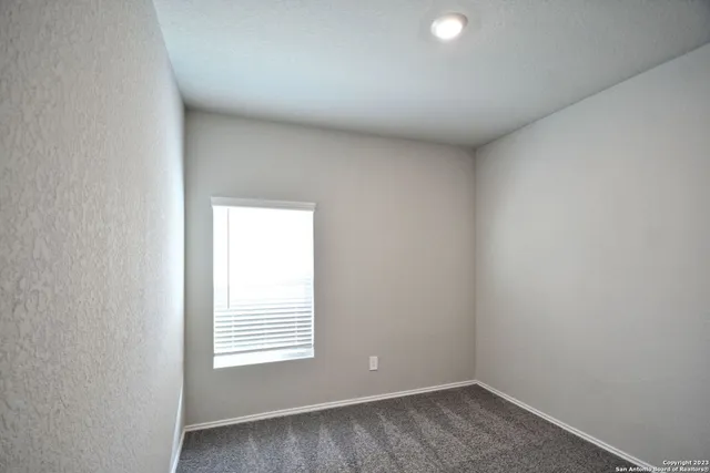 a view of a window in an empty room