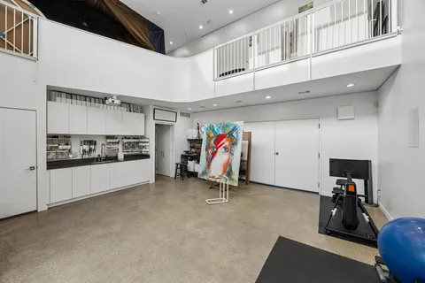 a view of a room with gym equipment