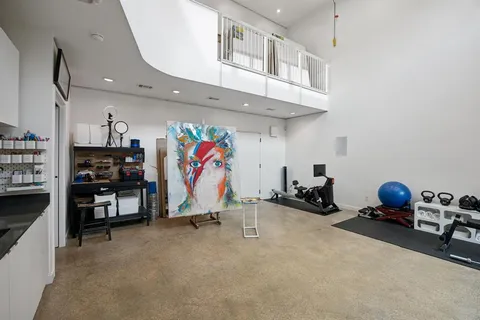 a view of a room with gym equipment