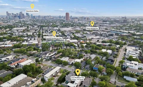 an aerial view of a city with lots of residential buildings