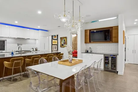 a view of a dining room with furniture