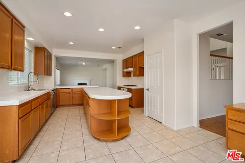 a view of an empty room with stairs