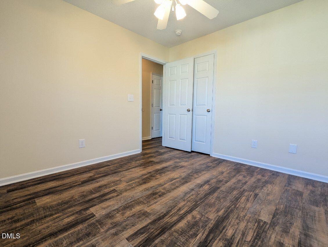 100 Reebe Circle Selma, NC 27576 - Photo 17 of 19 a view of an empty room and chandelier fan