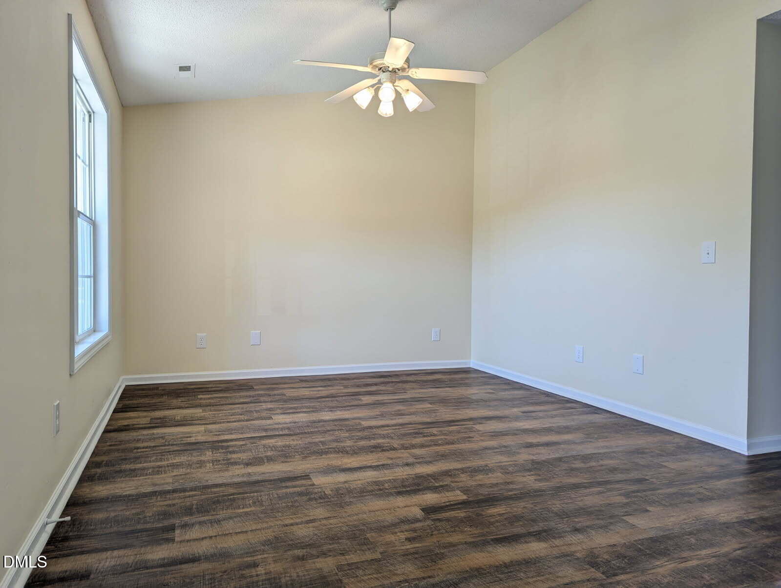 100 Reebe Circle Selma, NC 27576 - Photo 6 of 19 wooden floor in an empty room with a window