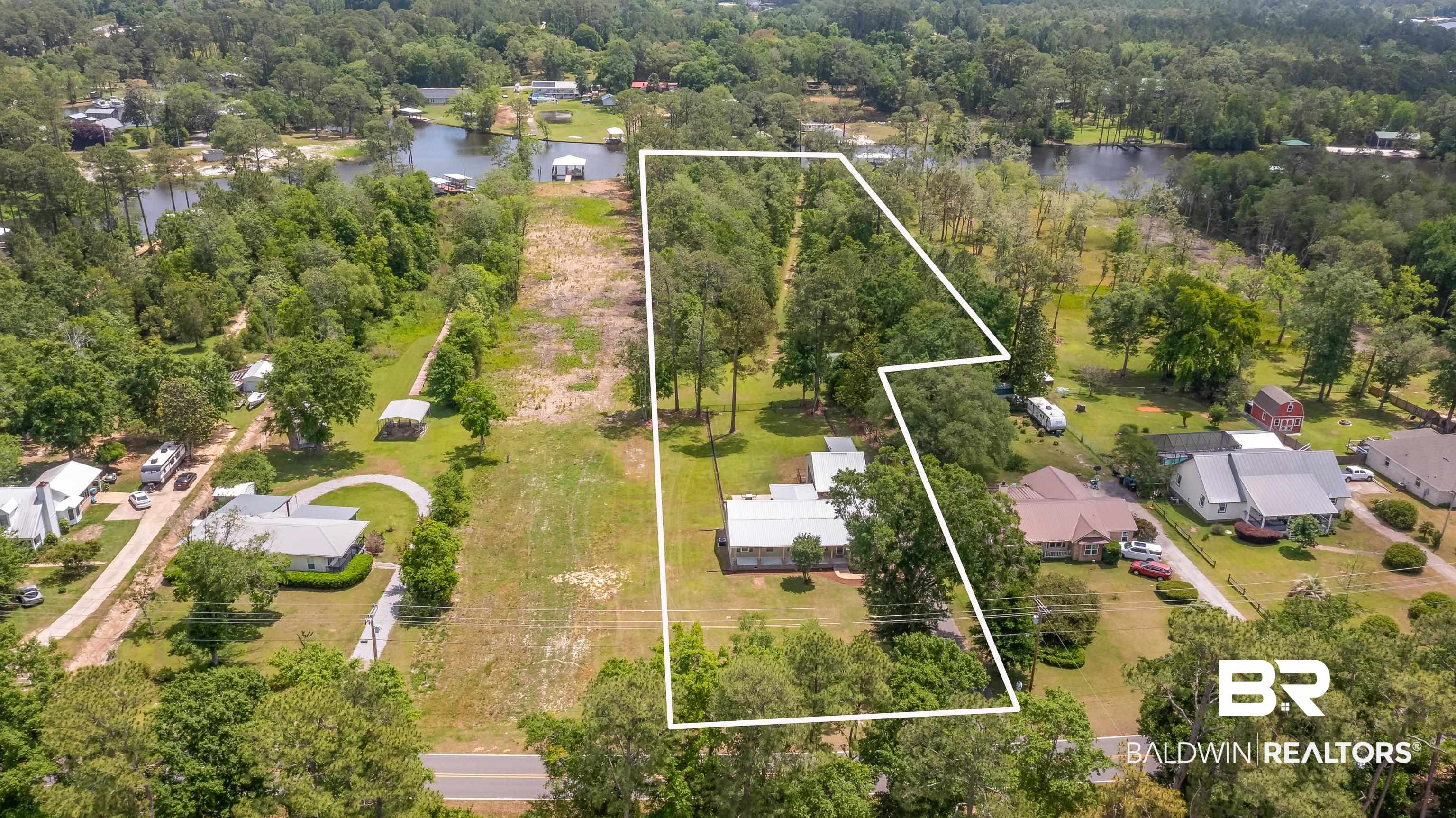 9771 Clarke Ridge Road Foley, AL 36535 - Photo 64 of 72 Drone / aerial view with a water view