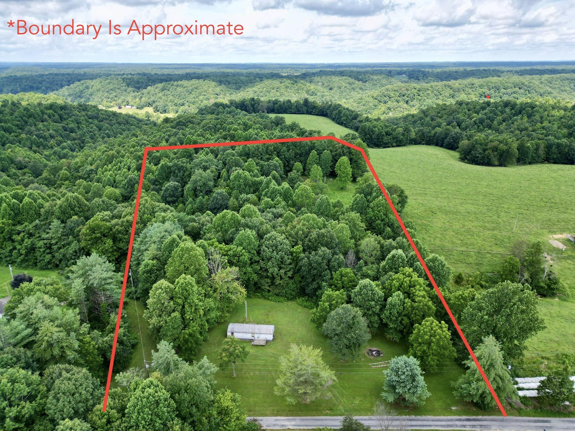 3280 Ewing Ridge Road Dunnville, KY 42528 - Photo 1 of 40 dji_fly_20250713_051142_345_175259489226