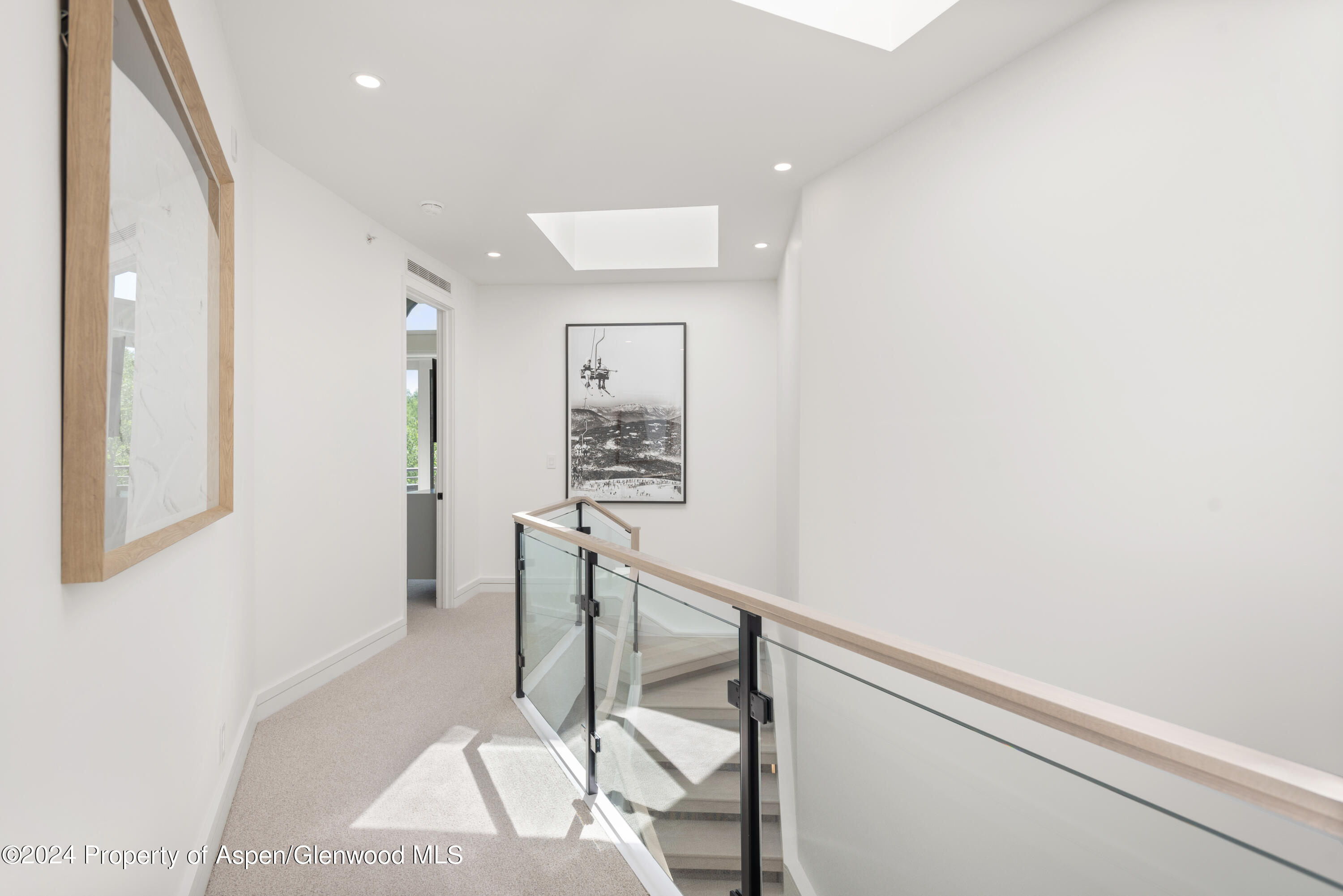 381 Ridge Road, Unit C4 Snowmass Village, CO 81615 - Photo 23 of 43 a view of entryway with wooden floor