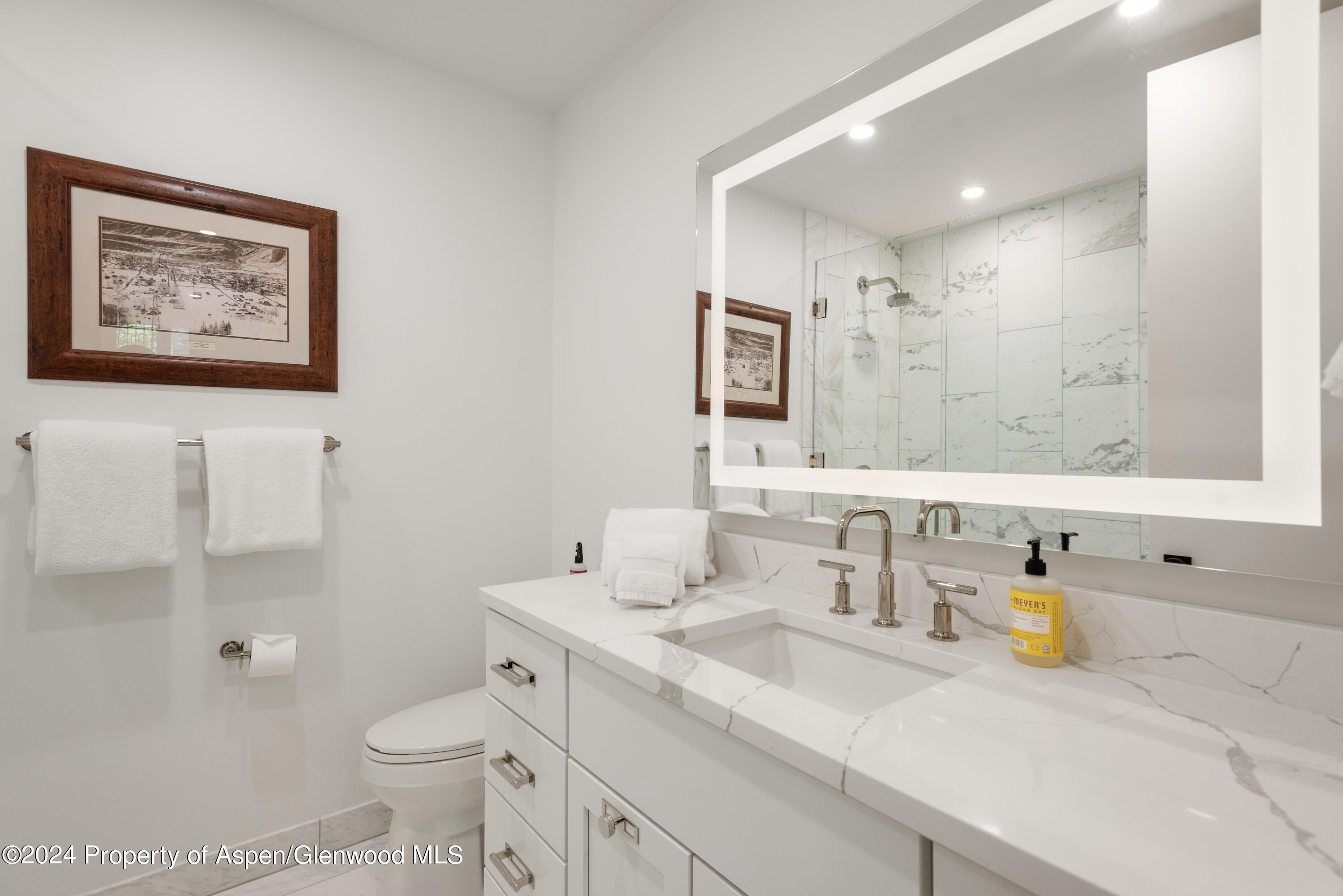 381 Ridge Road, Unit C4 Snowmass Village, CO 81615 - Photo 34 of 43 a bathroom with a toilet sink and mirror